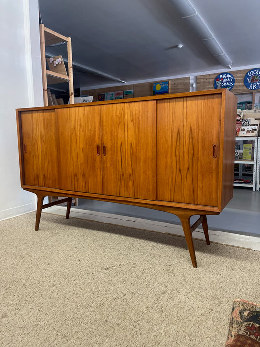 Mid-Century Danish Modern Likely Teak Credenza with Sculpted Base, Likely Rosewood Drawer Fronts with Brass toned Pulls