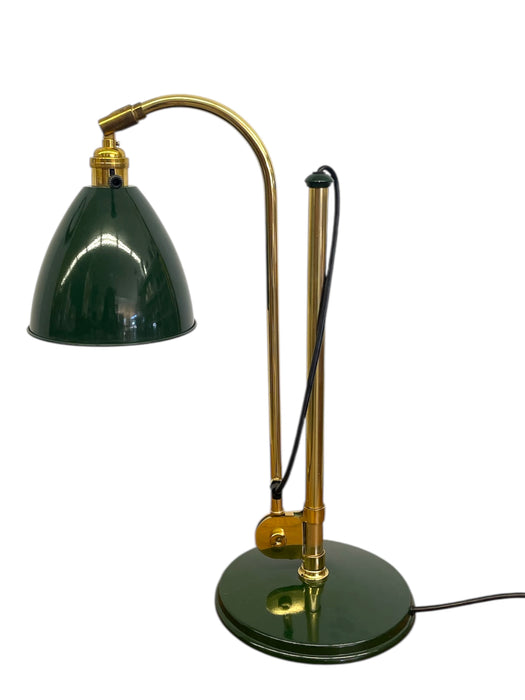 Vintage Adjustable Green and Brass Toned Desk Lamp with Articulated Arm and weighted base.