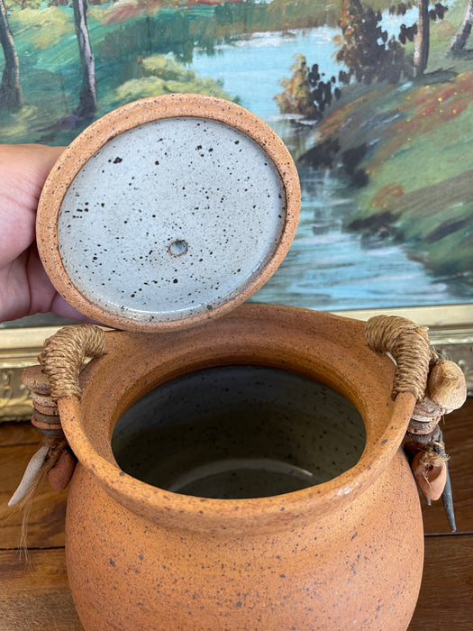 Handmade Indonesian Terracotta Lidded Jar with Beaded Raffia Accents and Seated Figure Finial