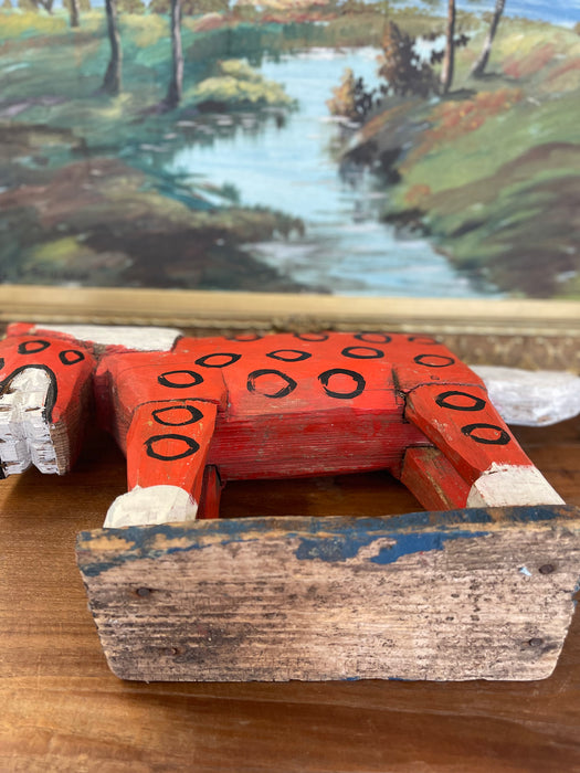 Primitive American Folk Art Painted Wood Horse Sculpture in Red and White with Black Circle Motif