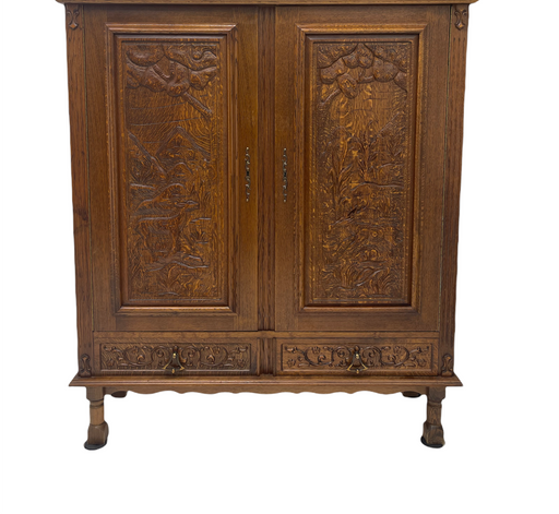 Vintage cabinet from Germany With Hand Carved Motifs. Circa 1930s