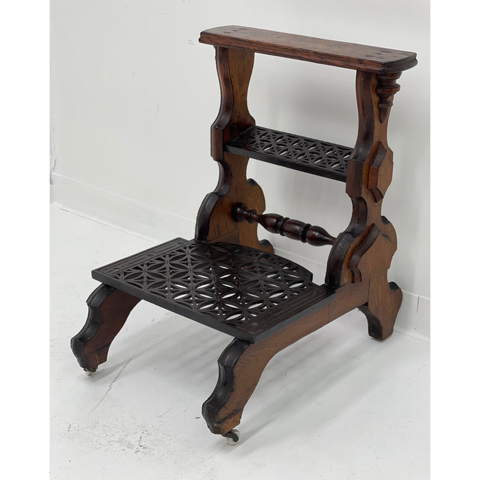 Antique decorative library steps table with metal accent and casters