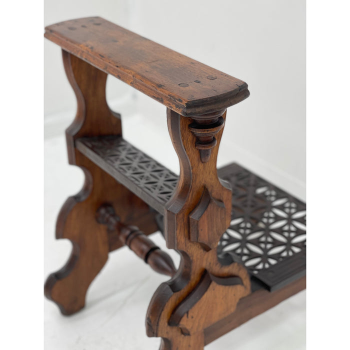 Antique decorative library steps table with metal accent and casters