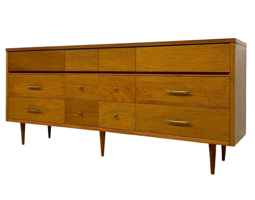 Vintage Mid Century Modern Credenza Dresser with 12 Drawers, Tapered Legs and Brass-Toned Hardware