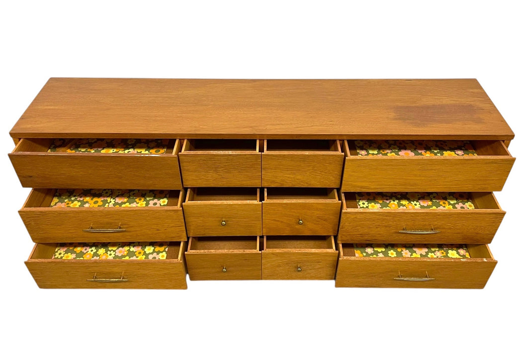 Vintage Mid Century Modern Credenza Dresser with 12 Drawers, Tapered Legs and Brass-Toned Hardware