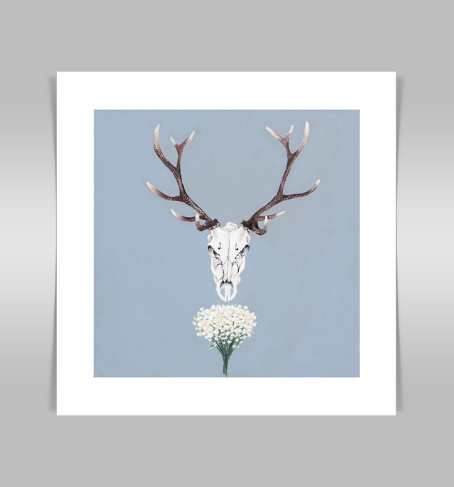Deer skull on cloud blue