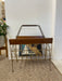 1960s Mid-Century Modern Brass Toned Wire and Wood Magazine Rack with Sculptural Handle