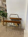 1960s Mid-Century Modern Brass Toned Wire and Wood Magazine Rack with Sculptural Handle
