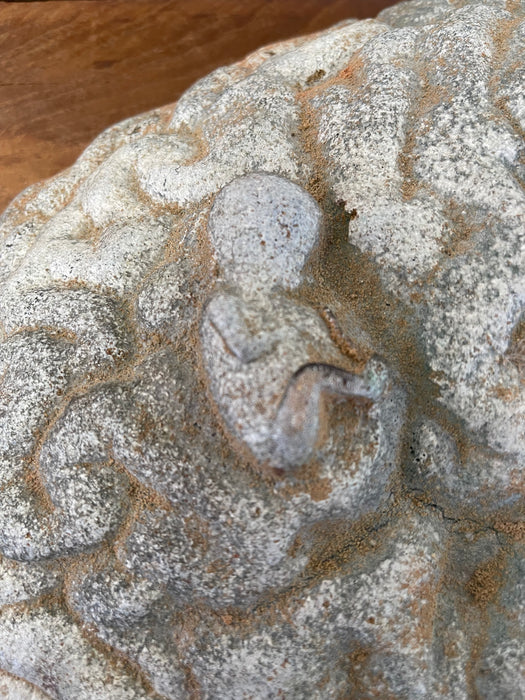 Vintage Cast Sculptural Art Piece with Embedded Figural Motifs and Textured Base