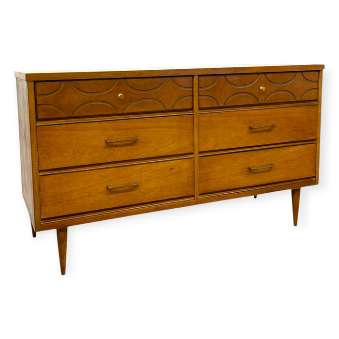 Vintage Bassett Mid Century Modern Walnut Double 6 Drawer Dresser with Carved Details.
