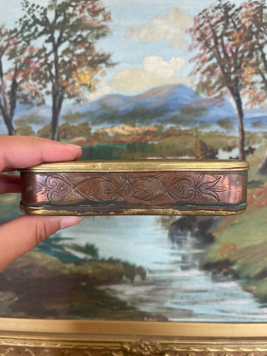 19th Century Possibly Dutch Brass and Copper Toned Snuff Box with Figural Tavern Scene and "T is Niet Anders" Inscription.