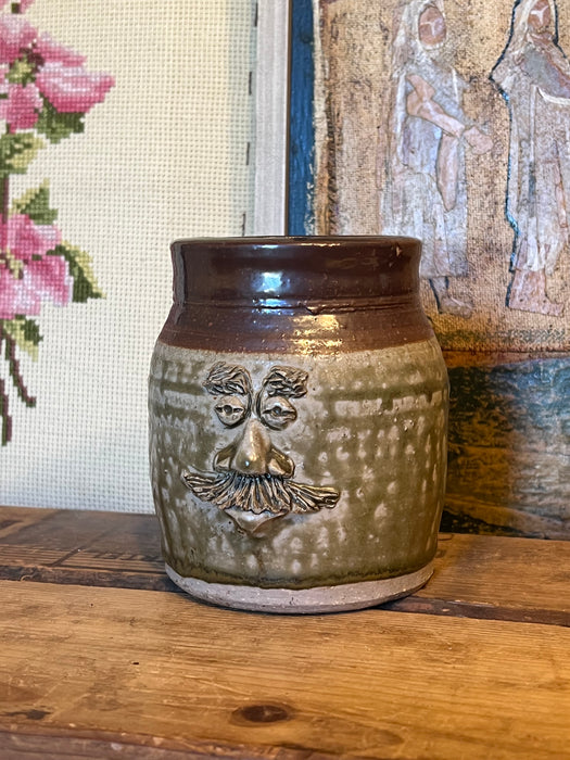 Vintage Handmade glaze pottery with abstract face.