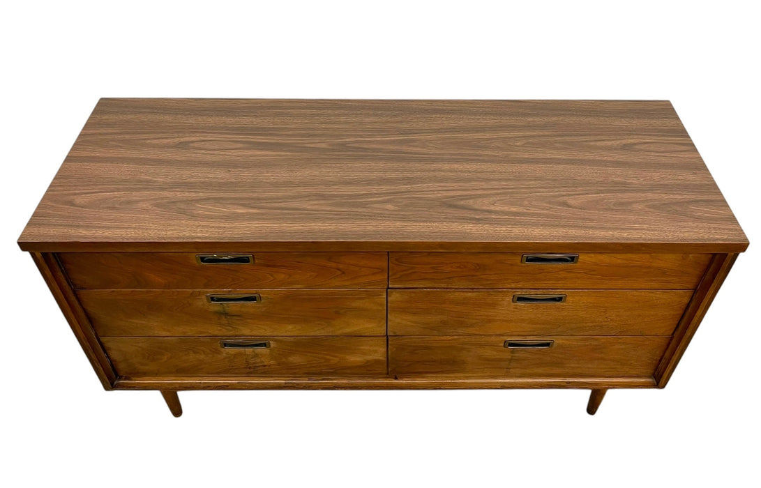 Mid Century Modern 6 Drawer Dresser with Sculpted Base and Brass-Toned Pulls.