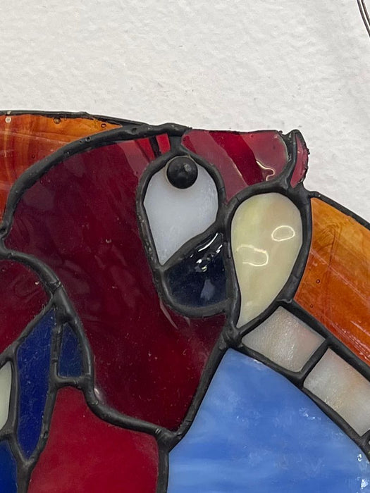 Vintage Stained Glass Parrot Artwork.