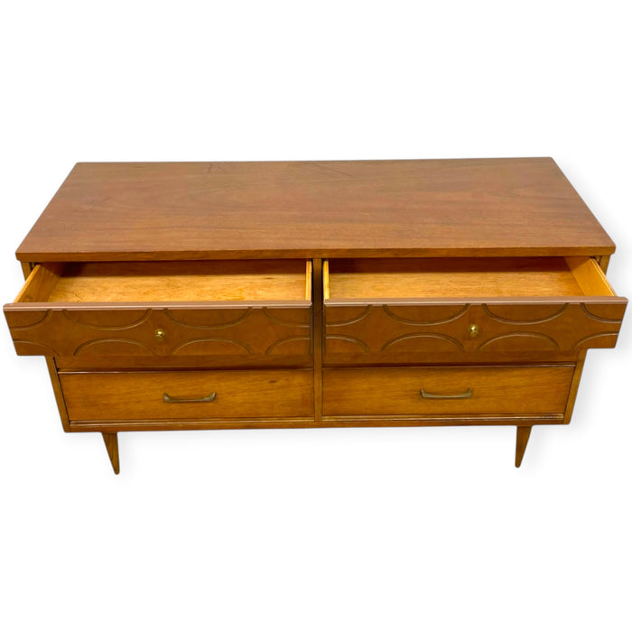 Vintage Bassett Mid Century Modern Walnut Double 6 Drawer Dresser with Carved Details.