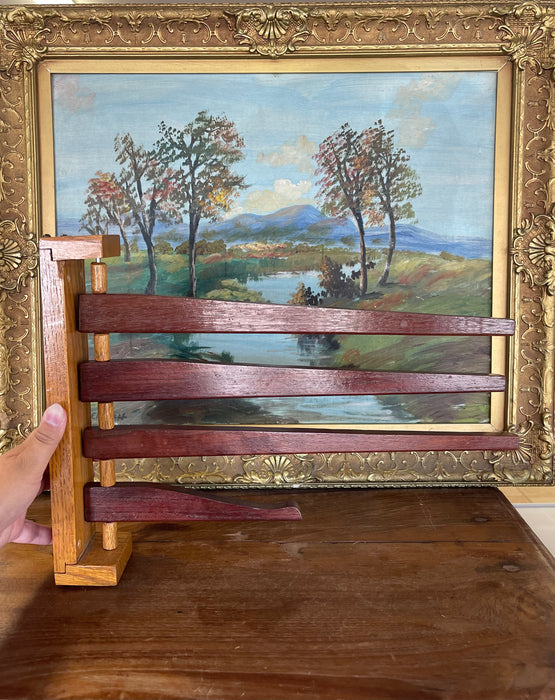 Vintage Wooden Swing-Arm Wall-Mounted Quilt or Towel Rack in Likely Oak and Mahogany.