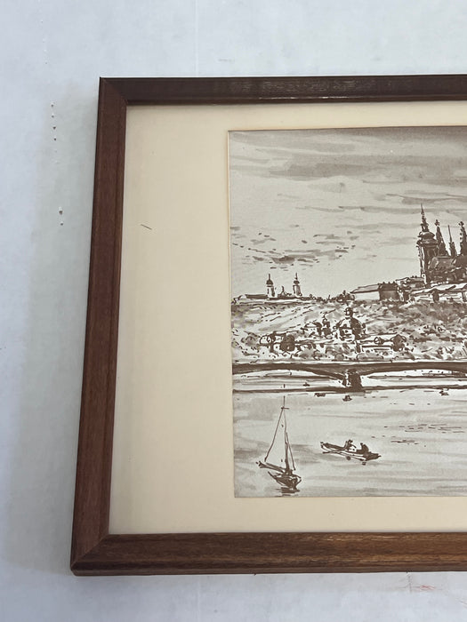 Vintage Framed Art Print depicting a town overlooking a body of water