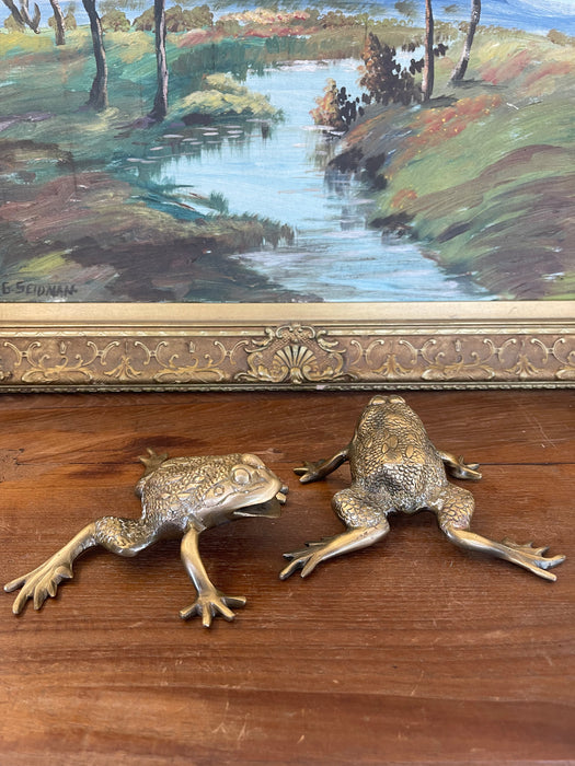 Pair of Vintage Brass Toned Crouching Frog Sculptures with Open Mouth and Textured Detailing.