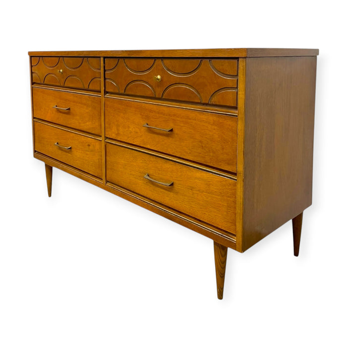 Vintage Bassett Mid Century Modern Walnut Double 6 Drawer Dresser with Carved Details.