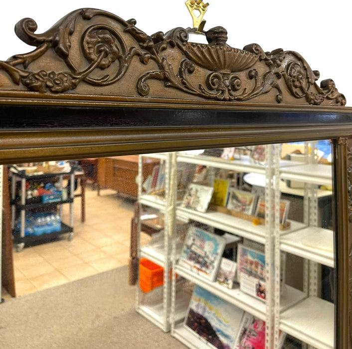 Antique Carved Wood Overmantel Mirror with Floral Urn Motifs and Scrolled Crest.