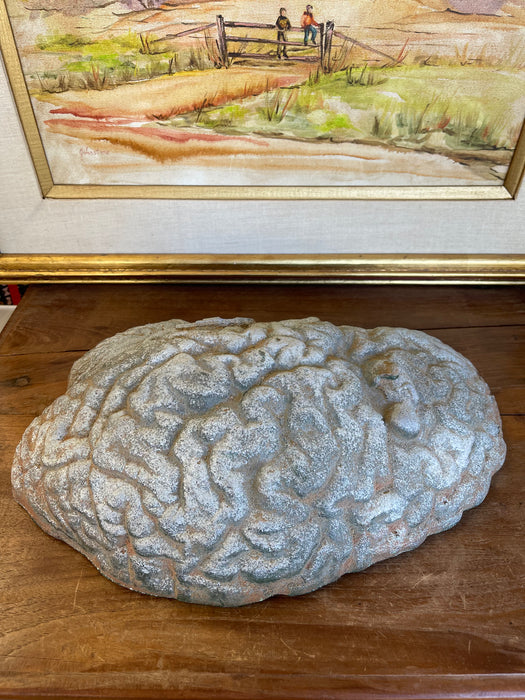 Vintage Cast Sculptural Art Piece with Embedded Figural Motifs and Textured Base