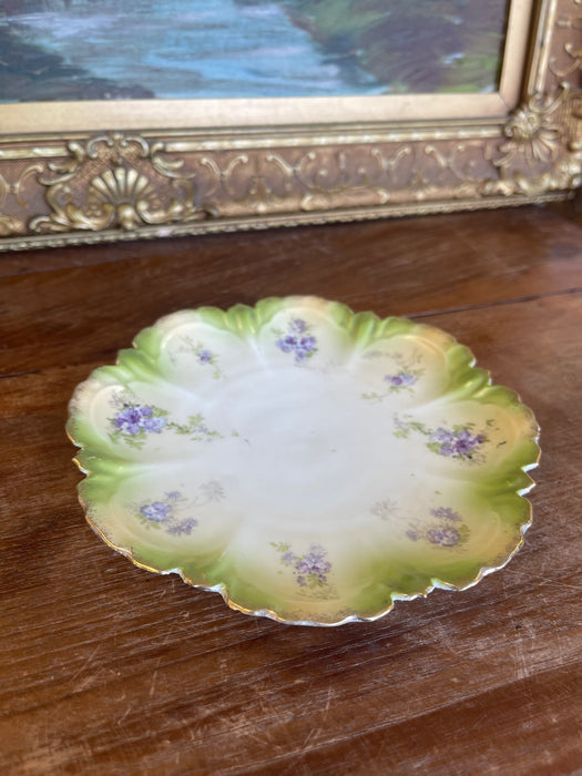 Hand-Painted Cabinet Plate with Green and Gold Toned Ombre Border and
Purple Floral Sprays