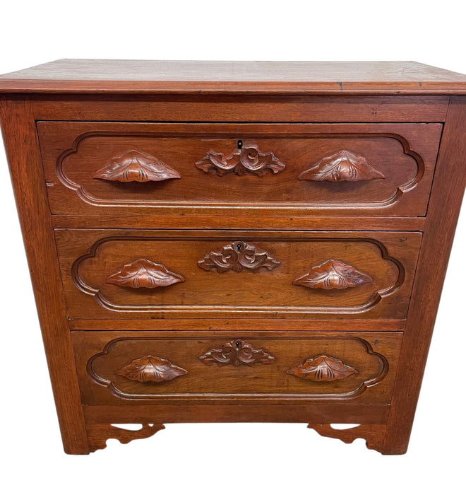 French Provincial Style Three-Drawer Chest with Carved Leaf Motifs and Dovetail Joinery