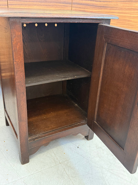 Vintage UK Imported Accent Table or Side Cabinet with Welsh Influences Carved Possibly Oak Door with Drop Hinges Dark Stained Wood