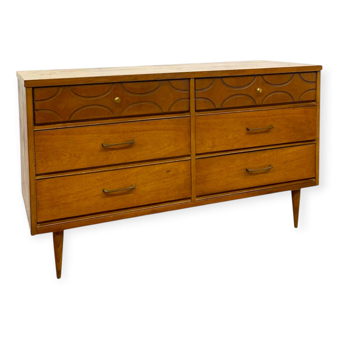 Vintage Bassett Mid Century Modern Walnut Double 6 Drawer Dresser with Carved Details.