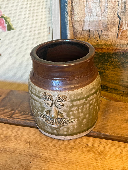 Vintage Handmade glaze pottery with abstract face.