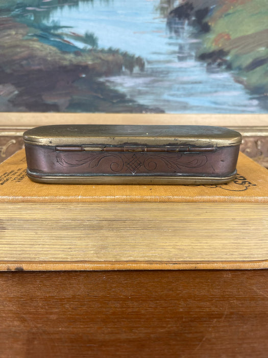 19th Century Possibly Dutch Brass and Copper Toned Snuff Box with Figural Tavern Scene and "T is Niet Anders" Inscription.