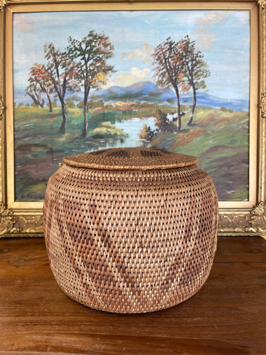 Vintage Handwoven Southeast Asian Rattan Lidded Basket with Saburst and Diamond Weave pattern