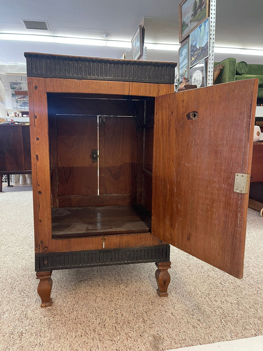 Vintage Dutch Colonial Style Cabinet With Carved Wood Accents.