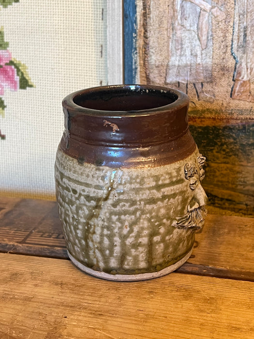 Vintage Handmade glaze pottery with abstract face.