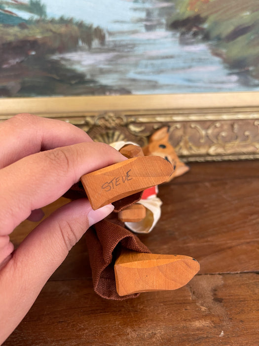 Vintage Hand-Carved Wooden Rabbit Doll with Articulated Limbs and Handmade Clothing.
