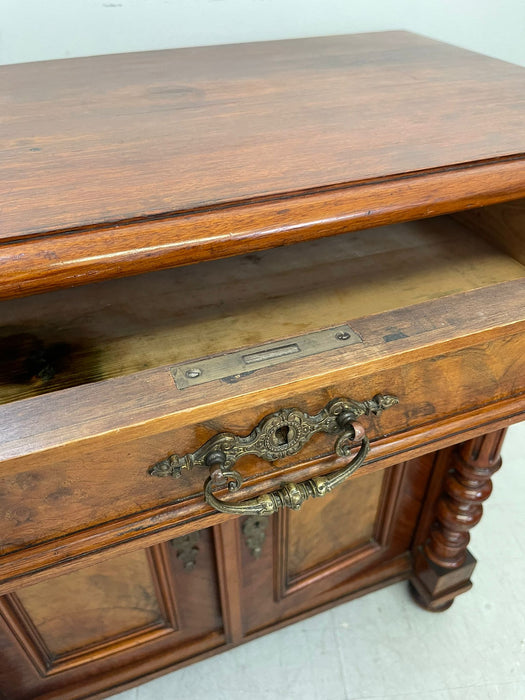 Vintage Wood Side Table With Burl Accented Front Panels and Carved Wood Details.
