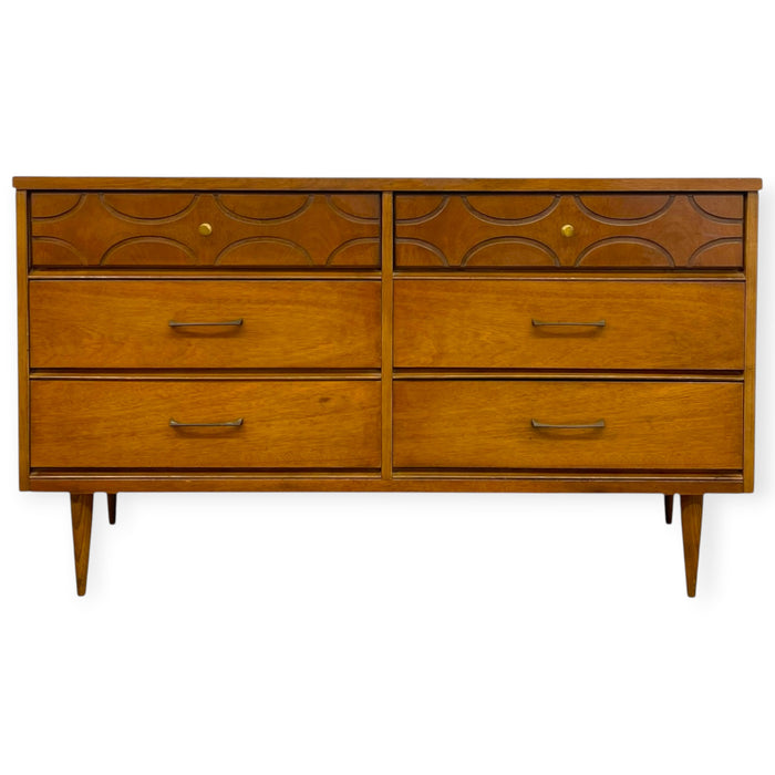 Vintage Bassett Mid Century Modern Walnut Double 6 Drawer Dresser with Carved Details.