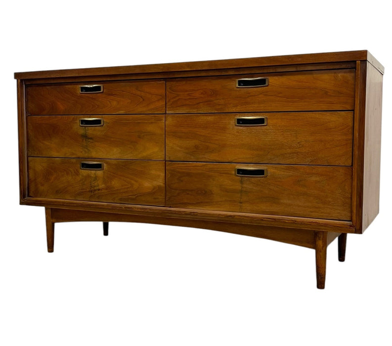 Mid Century Modern 6 Drawer Dresser with Sculpted Base and Brass-Toned Pulls.