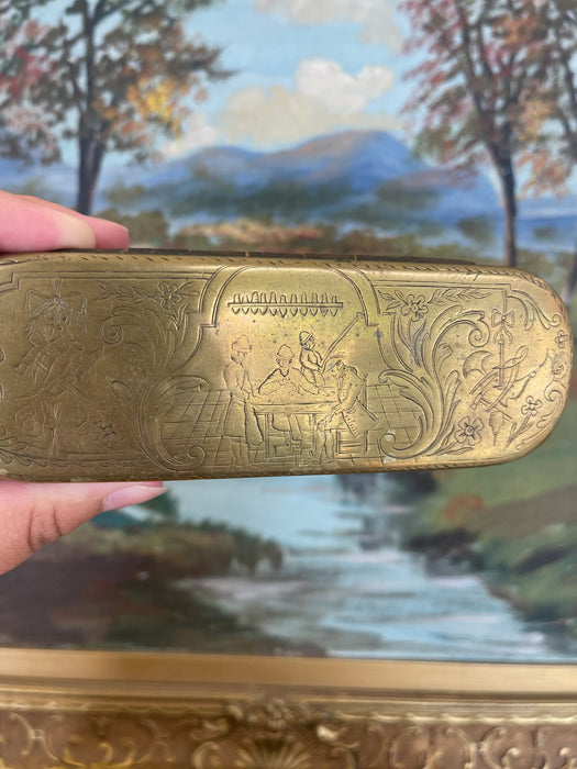 19th Century Possibly Dutch Brass and Copper Toned Snuff Box with Figural Tavern Scene and "T is Niet Anders" Inscription.