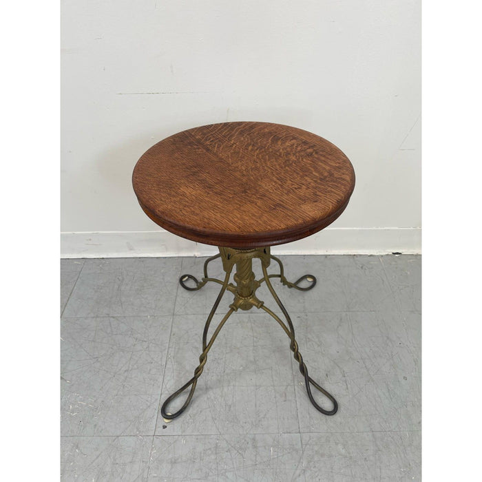 Vintage Stool With Adjustable Wooden Seat and Wrought Iron Base.