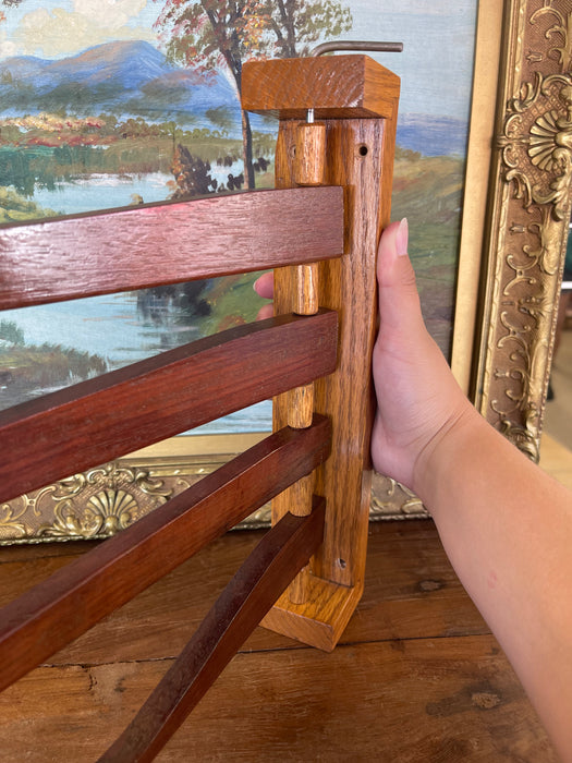 Vintage Wooden Swing-Arm Wall-Mounted Quilt or Towel Rack in Likely Oak and Mahogany.