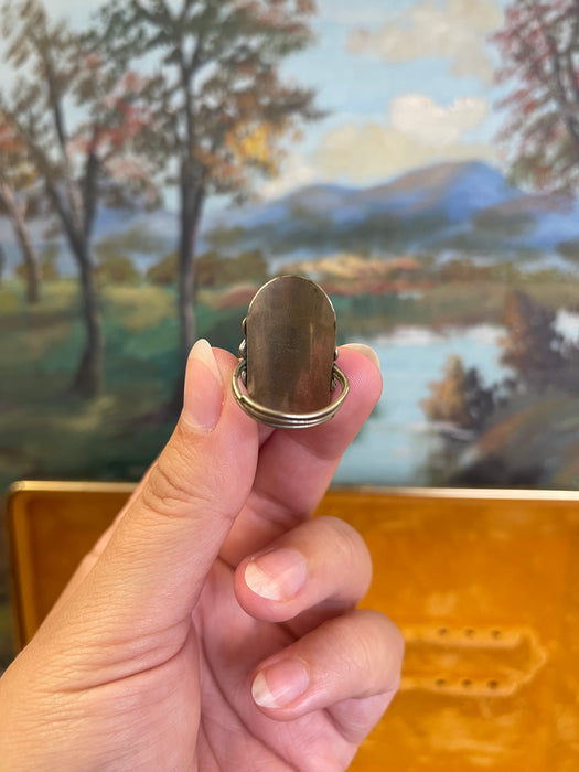 Vintage Adjustable Ring with Oval Orange Stone and Scrollwork Setting