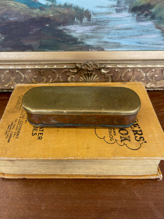 19th Century Possibly Dutch Brass and Copper Toned Snuff Box with Figural Tavern Scene and "T is Niet Anders" Inscription.