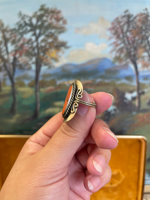 Vintage Adjustable Ring with Oval Orange Stone and Scrollwork Setting