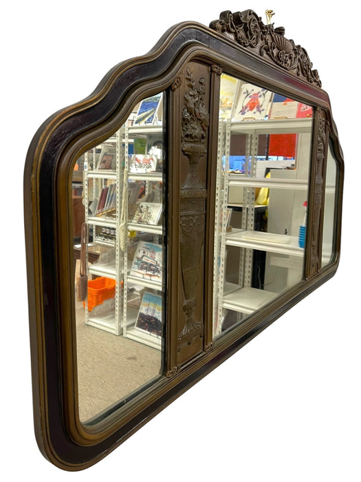 Antique Carved Wood Overmantel Mirror with Floral Urn Motifs and Scrolled Crest.