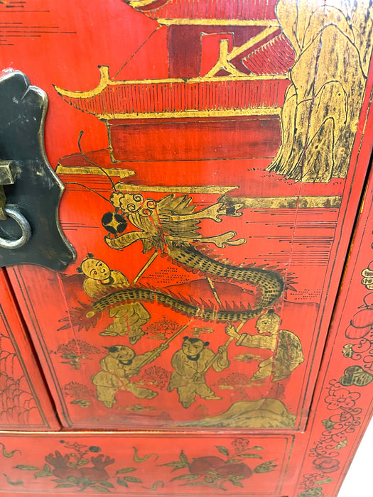 Chinese Red Cabinet with Gilt Figural and Dragon Motifs