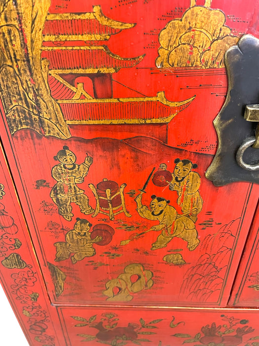 Chinese Red Cabinet with Gilt Figural and Dragon Motifs