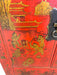 Chinese Red Cabinet with Gilt Figural and Dragon Motifs