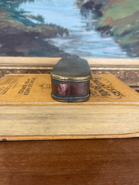 19th Century Possibly Dutch Brass and Copper Toned Snuff Box with Figural Tavern Scene and "T is Niet Anders" Inscription.