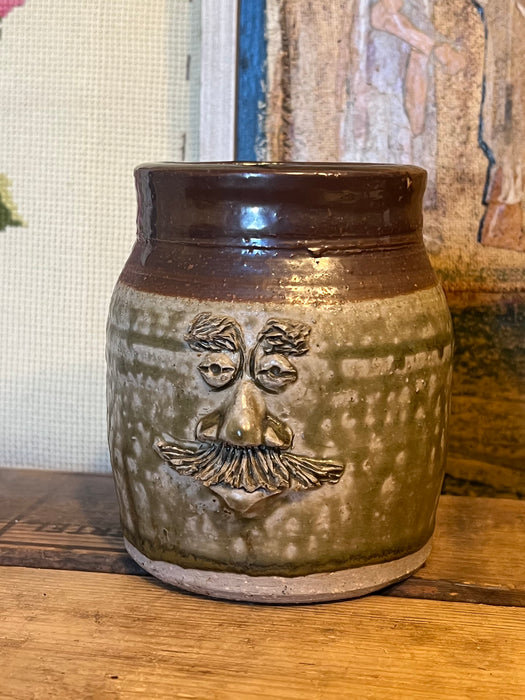 Vintage Handmade glaze pottery with abstract face.